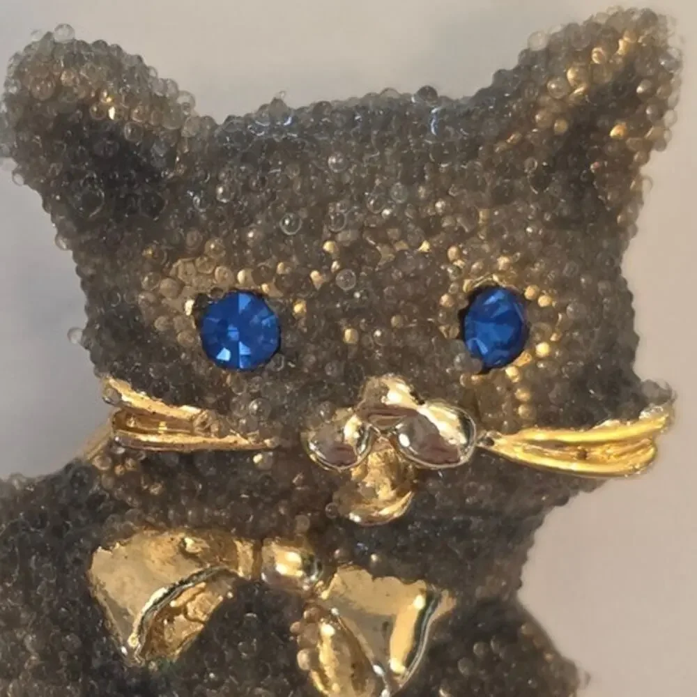 Kitty Cat with Blue Rhinestone Eyes Brooch Gold Tone Encrusted Playful Bow